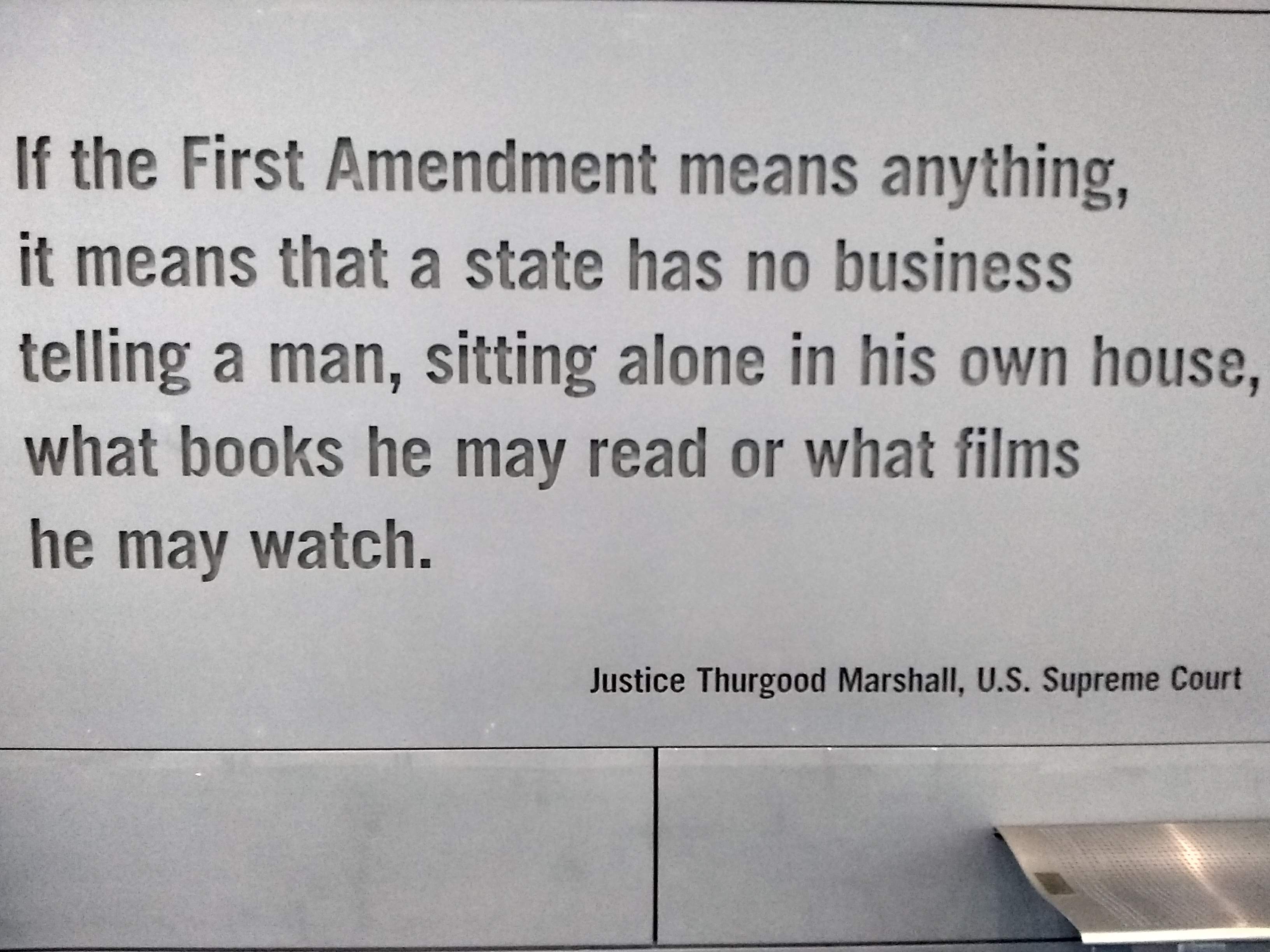 Stone wall at Newseum in D.C. with etched quote: If the First Amendment means anything, it means that a state has no business telling a man, sitting alone in his own house, what books he may read or what films he may watch.